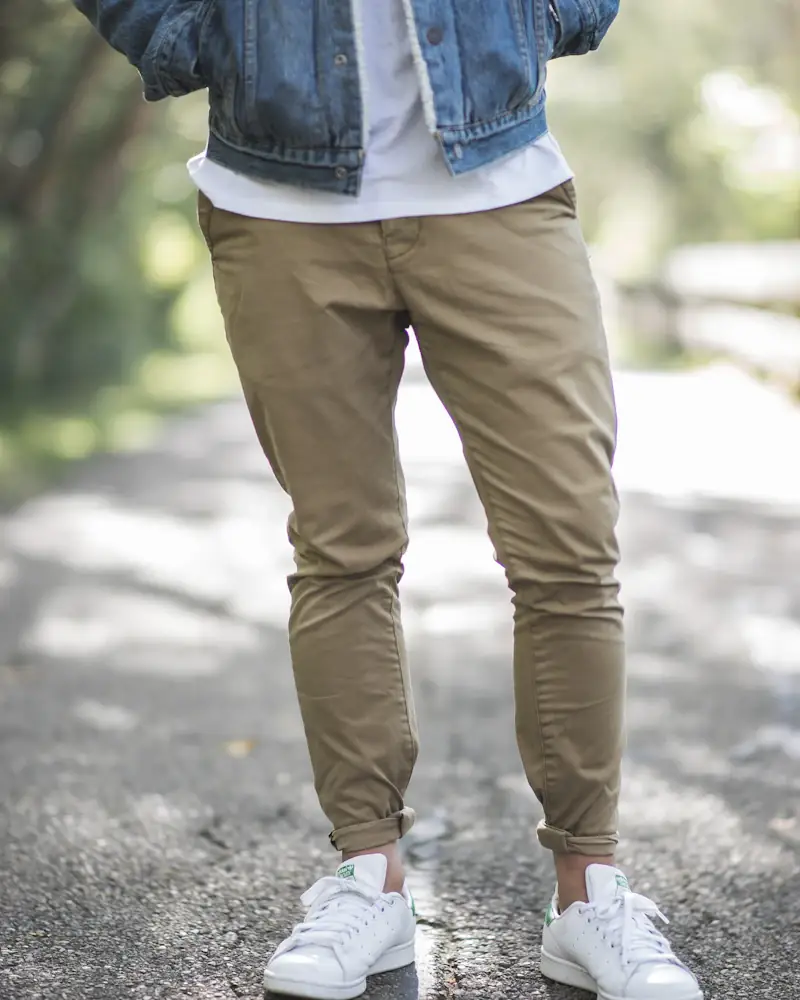 Khaki chinos worn with white trainers