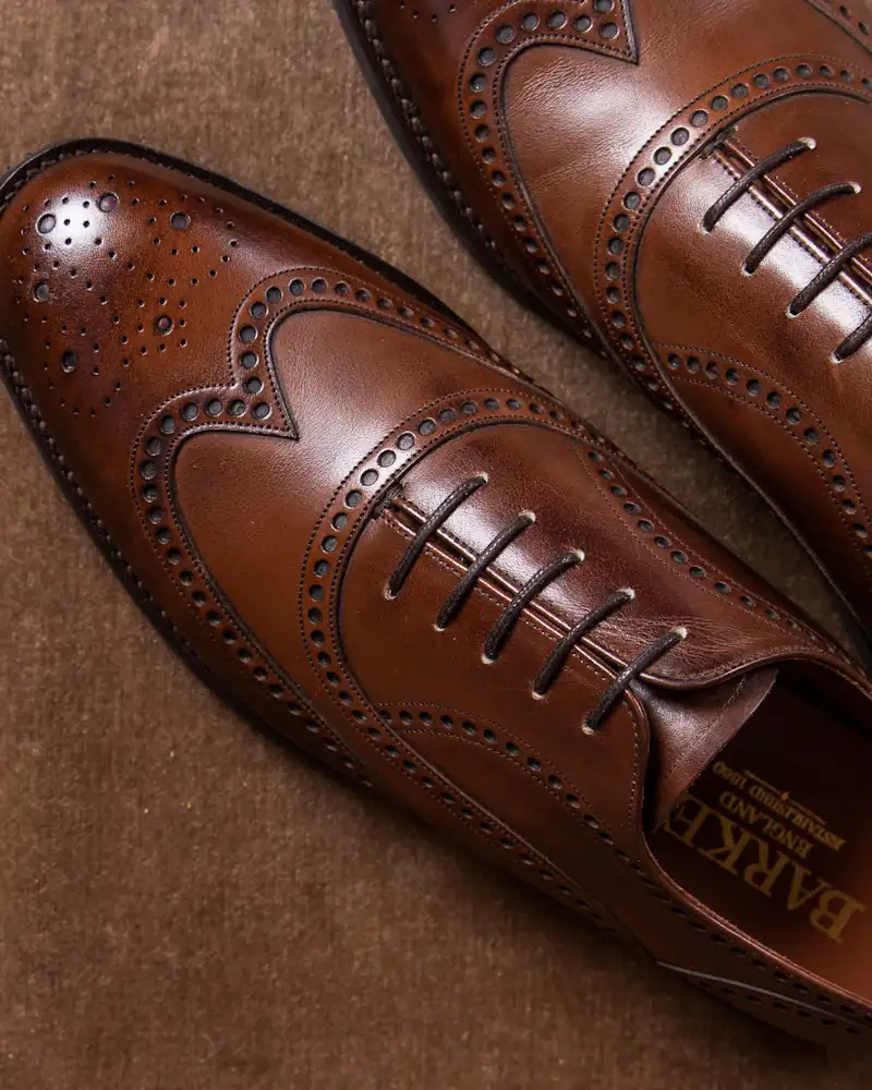 Dark oak leather brogues, close-up